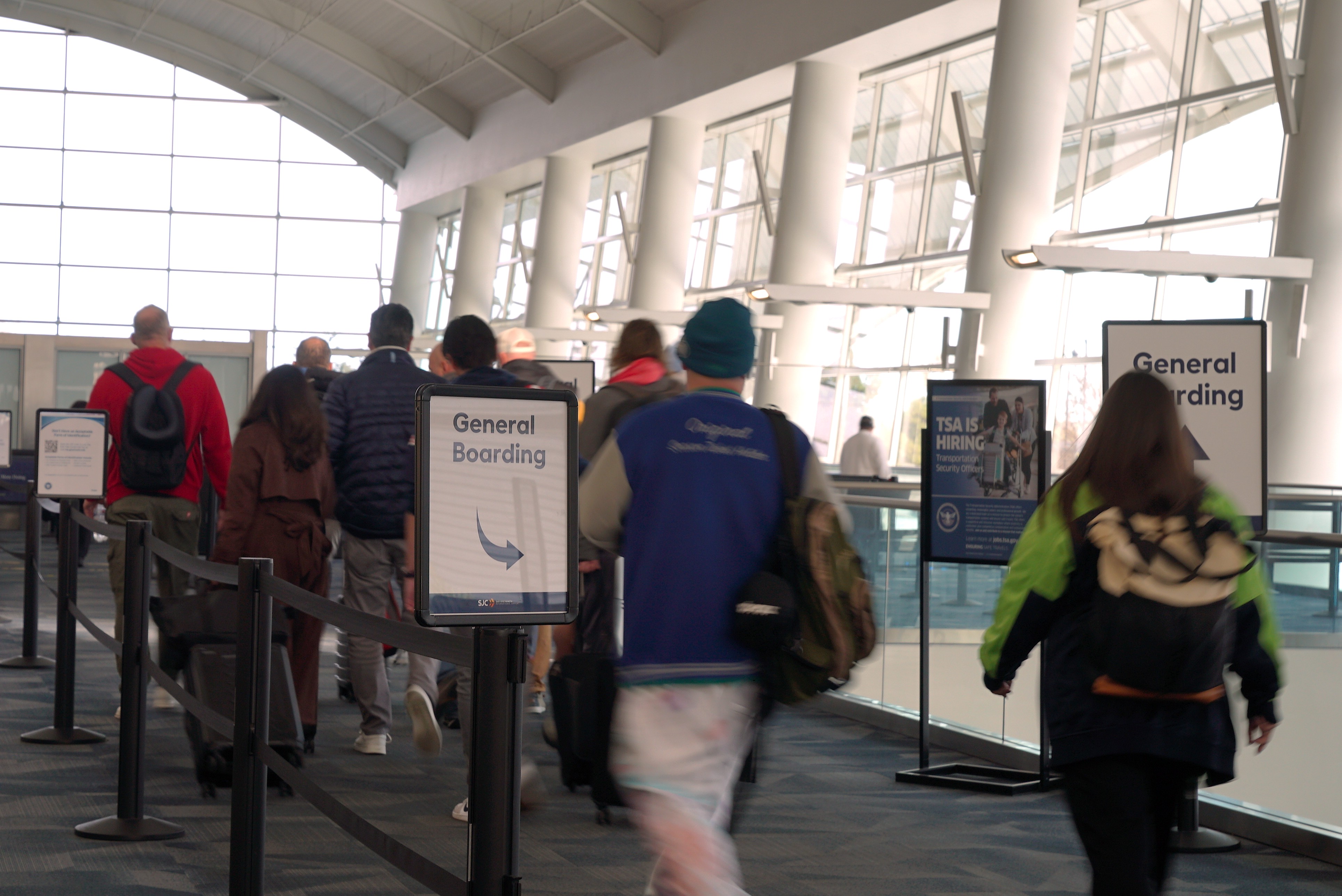 Passengers walking towards security