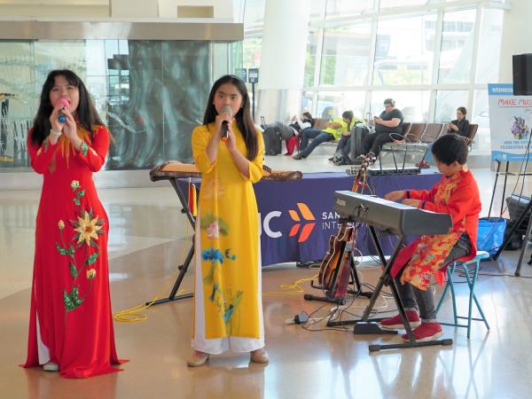 MiFaSol Band performing in Terminal B at Make Music Day 2023.