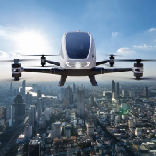 An eVTOL flies above a city.